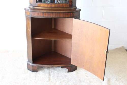 A fantastic Edwardian antique corner display cabinet with a glass door and spacious bottom cupboard