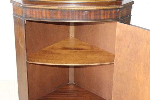 A fantastic Edwardian antique corner display cabinet with a glass door and spacious bottom cupboard