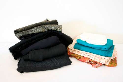 A lovely job lot of different colours and sizes of dress materials in good condition. RS17Sale