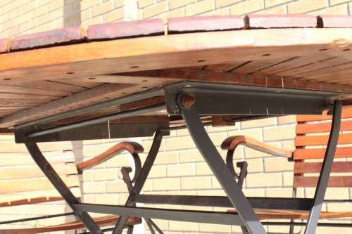 A great quality 4-seater wood & wrought iron patio set with 4x folding chairs and a folding table!!