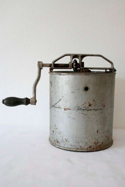 A fantastic vintage metal churn, awesome as a display piece.