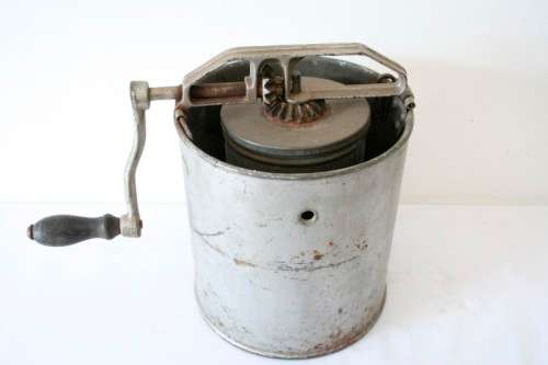 A fantastic vintage metal churn, awesome as a display piece.