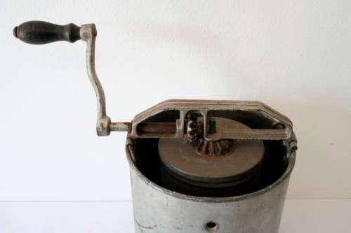 A fantastic vintage metal churn, awesome as a display piece.