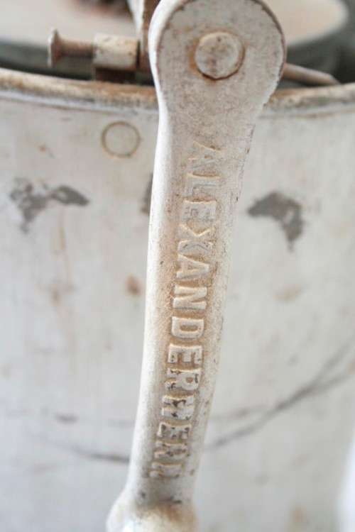 A fantastic vintage metal churn, awesome as a display piece.