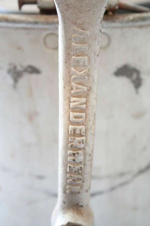A fantastic vintage metal churn, awesome as a display piece.