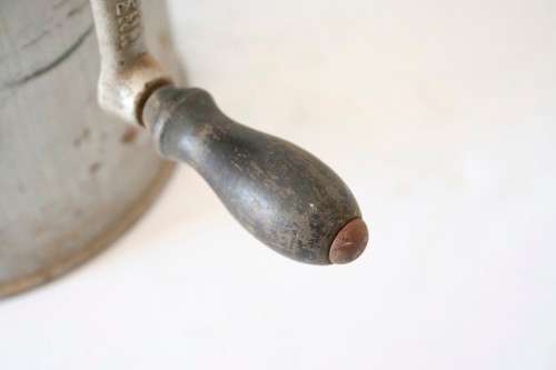 A fantastic vintage metal churn, awesome as a display piece.