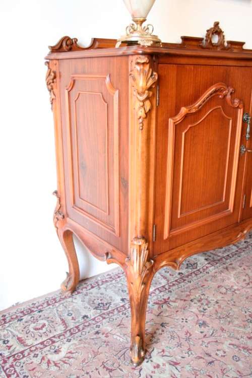 An exquisite vintage side server cabinet with carved detailing and loads of drawer & cupboard space