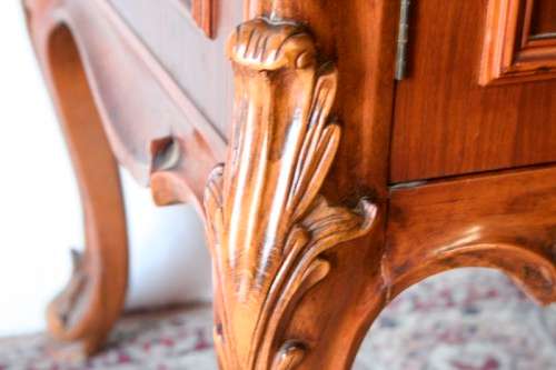 An exquisite vintage side server cabinet with carved detailing and loads of drawer & cupboard space