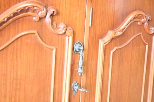 An exquisite vintage side server cabinet with carved detailing and loads of drawer & cupboard space
