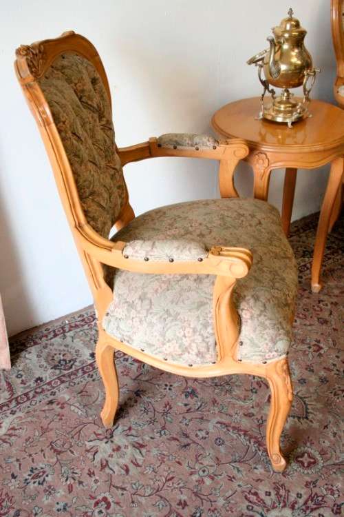 Two magnificent Victorian Oak hand carved chairs with deep button detailing!