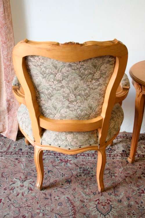 Two magnificent Victorian Oak hand carved chairs with deep button detailing!