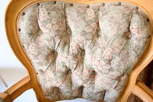 Two magnificent Victorian Oak hand carved chairs with deep button detailing!
