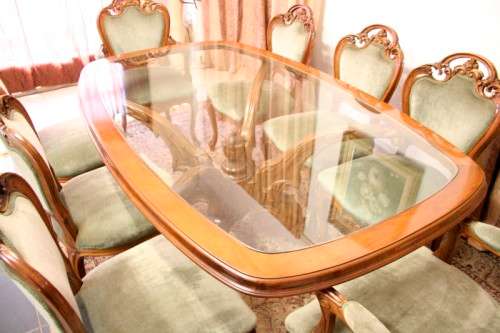 An impeccable antique Victorian Walnut 8-seater dining room suite w/ exquisite carved detailing
