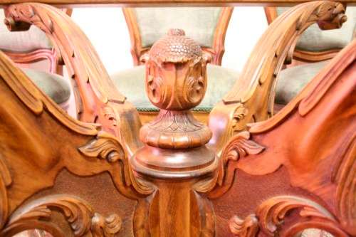 An impeccable antique Victorian Walnut 8-seater dining room suite w/ exquisite carved detailing