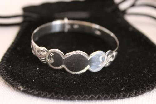 A beautifully detailed sterling silver adjustable baby's Christening/ ID bracelet - can be engraved!