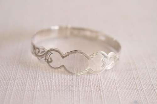 A beautifully detailed sterling silver adjustable baby's Christening/ ID bracelet - can be engraved!
