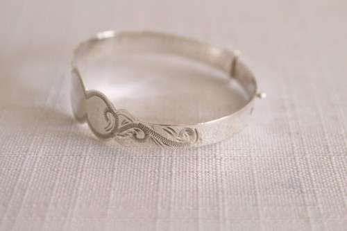A beautifully detailed sterling silver adjustable baby's Christening/ ID bracelet - can be engraved!