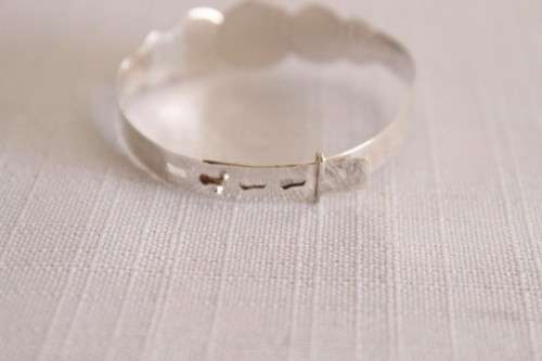 A beautifully detailed sterling silver adjustable baby's Christening/ ID bracelet - can be engraved!