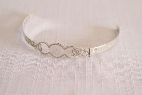 A beautifully detailed sterling silver adjustable baby's Christening/ ID bracelet - can be engraved!