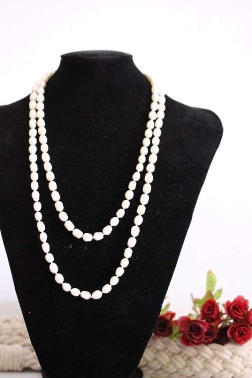 A beautiful 126cm endless-strand of white cultured baroque pearls in stunning condition