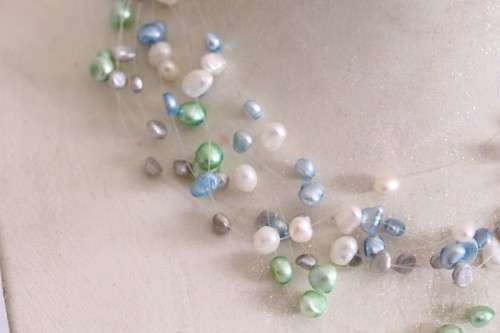 A superb white, blue, silver and green genuine pearl multi-strand ladies necklace w/ a silver clasp