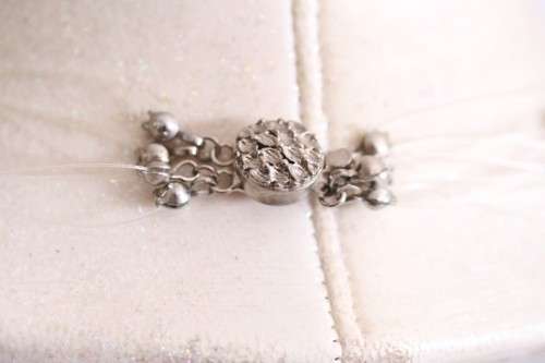 A superb white, blue, silver and green genuine pearl multi-strand ladies necklace w/ a silver clasp