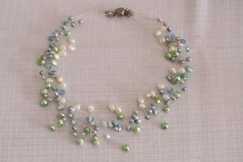 A superb white, blue, silver and green genuine pearl multi-strand ladies necklace w/ a silver clasp