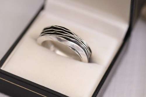 An unusual designed Mexican hand-made sterling silver gents ring in a ring box