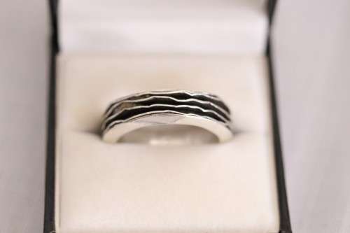 An unusual designed Mexican hand-made sterling silver gents ring in a ring box