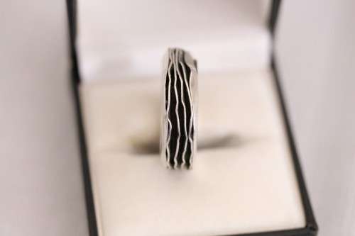 An unusual designed Mexican hand-made sterling silver gents ring in a ring box
