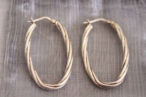 A superb pair of Italian made "twisted" sterling silver (925) ladies loop earrings for pierced ears