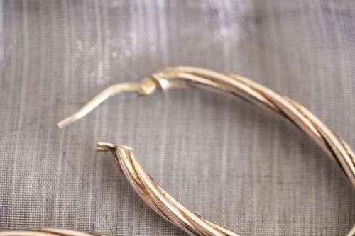 A superb pair of Italian made "twisted" sterling silver (925) ladies loop earrings for pierced ears