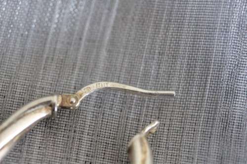 A superb pair of Italian made "twisted" sterling silver (925) ladies loop earrings for pierced ears