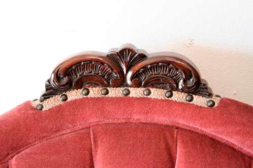 Two elegant hand carved Victorian arm chairs with deep button detailing & gorgeous pink fabric.