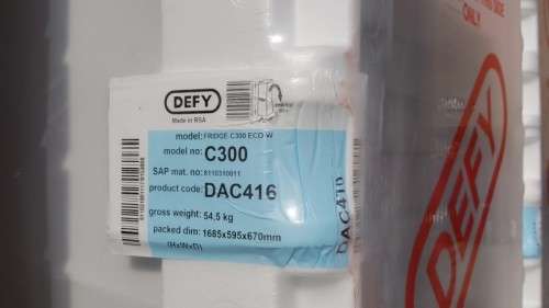 Brand new white 247Lt Defy C300 (DAC416) Eco upright fridge/ freezer - still in its packaging