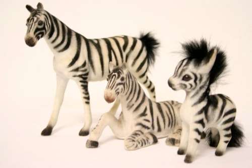 **RS17** A lovely collection of three different ornamental decorative/ display zebras