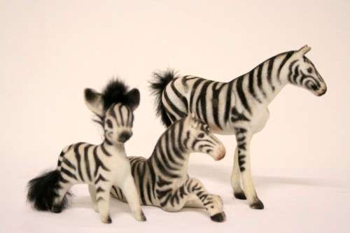 **RS17** A lovely collection of three different ornamental decorative/ display zebras