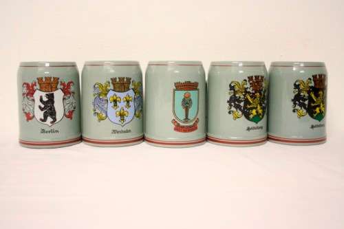 An awesome collection of five (500ml) German branded beer tankards in good condition