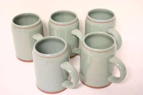 An awesome collection of five (500ml) German branded beer tankards in good condition