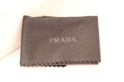 An awesome pair of black Italian made Prada (model SPR22M) ladies sunglasses w/ grey gradient lenses