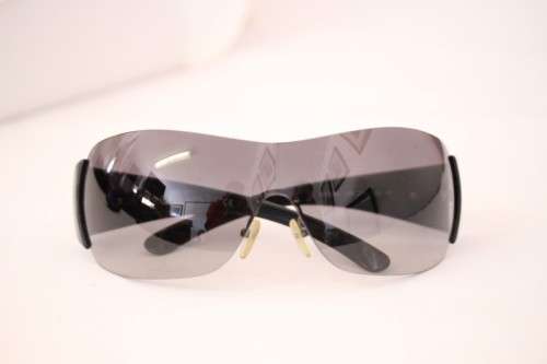 An awesome pair of black Italian made Prada (model SPR22M) ladies sunglasses w/ grey gradient lenses