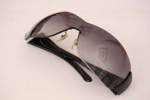 An awesome pair of black Italian made Prada (model SPR22M) ladies sunglasses w/ grey gradient lenses