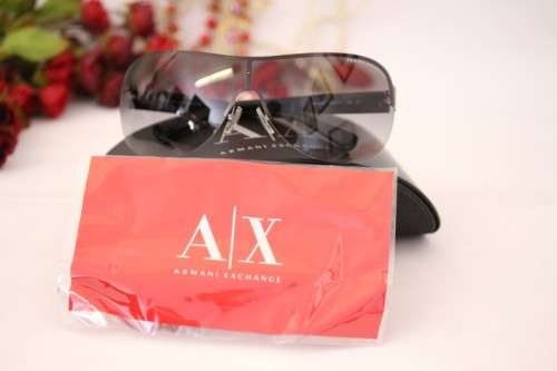 A stunning pair of black Armani Exchange (model AX2007) unisex sunglasses in its original case