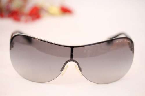 A stunning pair of black Armani Exchange (model AX2007) unisex sunglasses in its original case