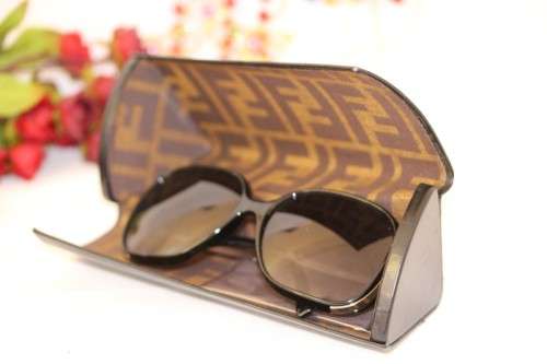 A stunning and stylish original Fendi ladies black and silver sunglasses in its original hard case