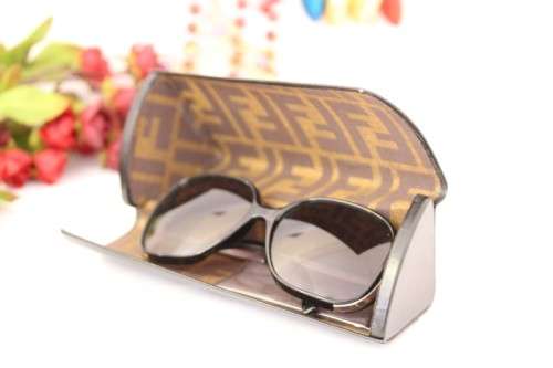 A stunning and stylish original Fendi ladies black and silver sunglasses in its original hard case
