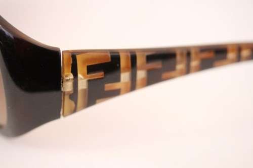 A beautiful pair of original Fendi ladies tortoise shell style sunglasses in its original case