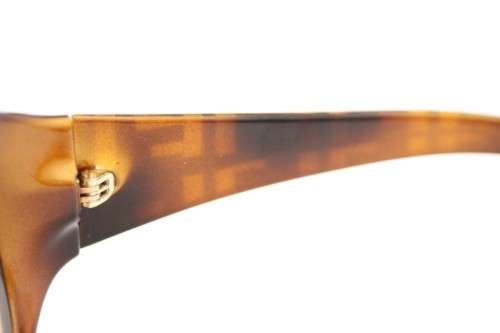 A beautiful pair of original Fendi ladies tortoise shell style sunglasses in its original case