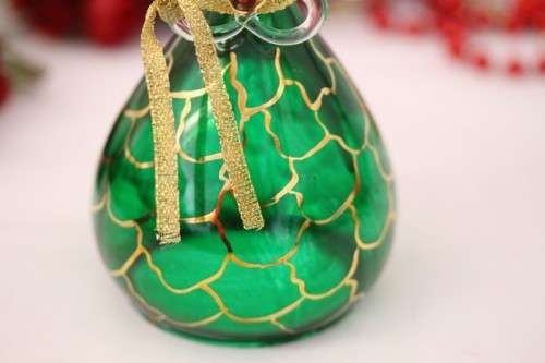 **RS17** A stunning hand-blown Italian green-glass angel finished w/ gold detailing by Flamigni