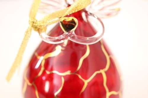 **RS17** A made hand-blown Italian red-glass angel finished with gold detailing by Flamigni